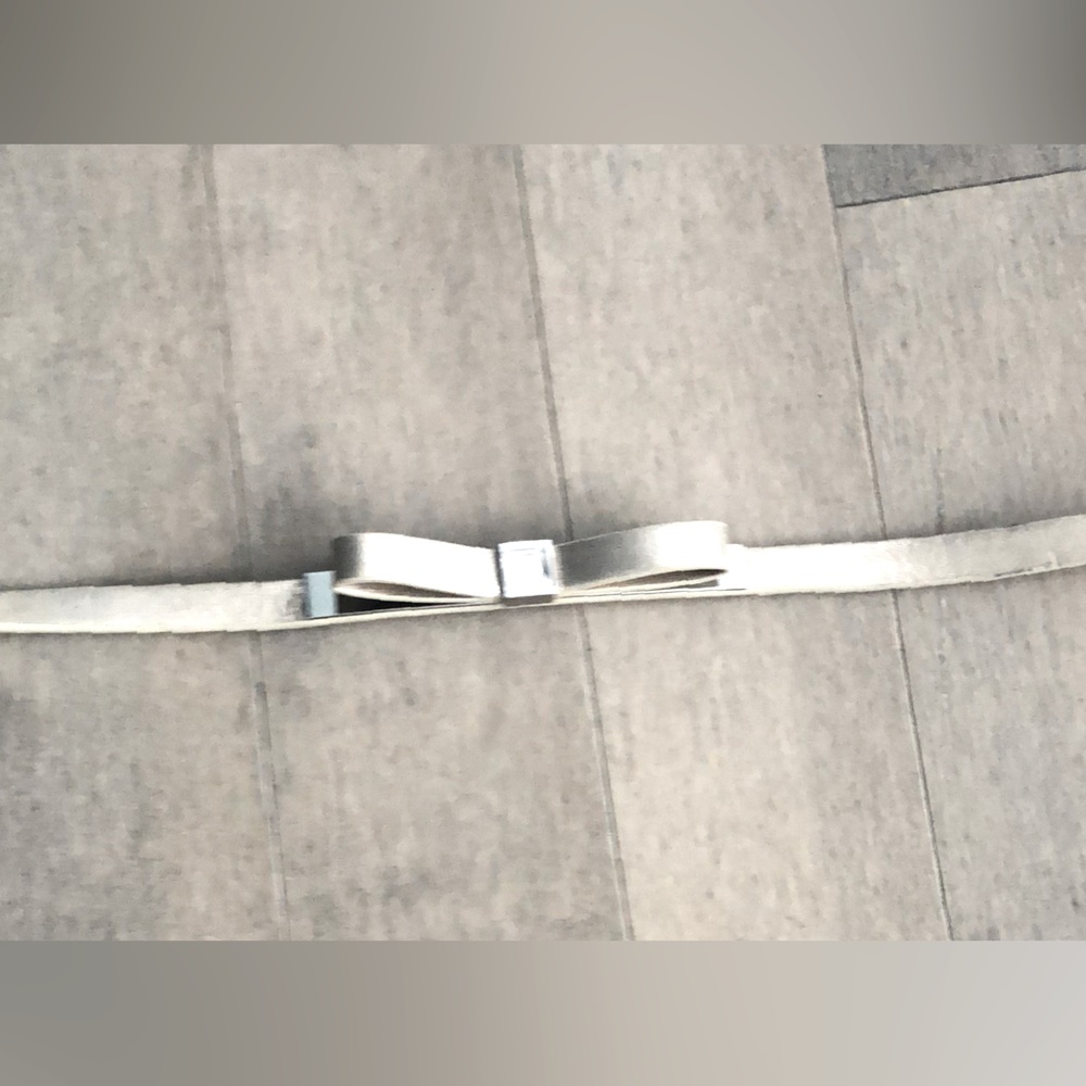 38 inches long silver belt with bow